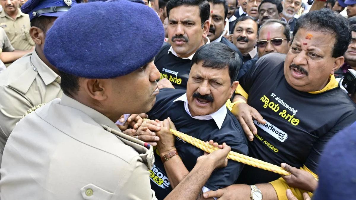 Ruling and opposition parties protest outside Vidhan Soudha in Bengaluru over resignation of B. Nagendra for embezzlement in Valmiki corporation