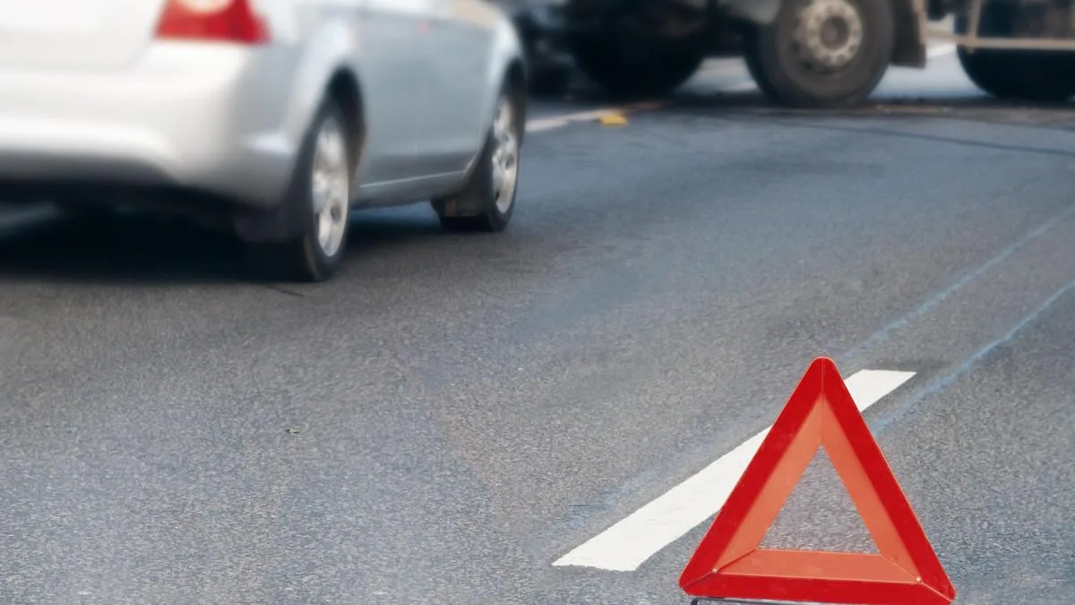 Four killed after car hits truck in Dharwad district