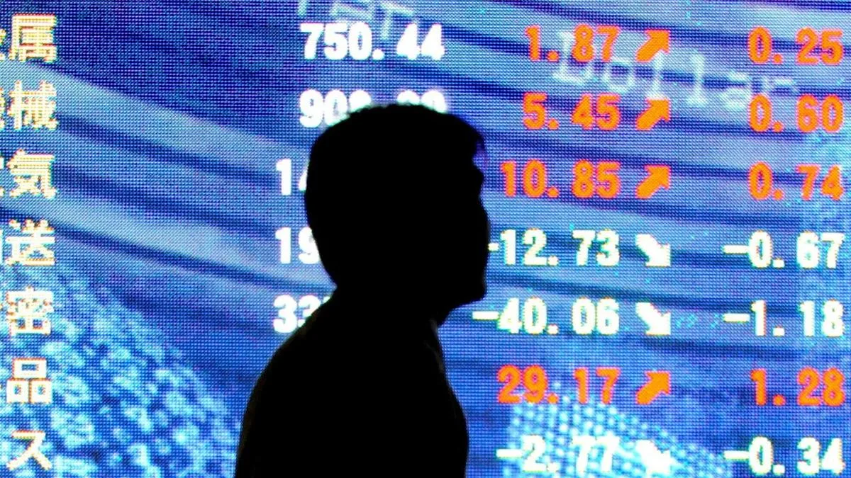 Tech leads shares higher in Asia, oil eases