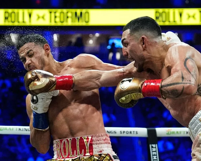 Teófimo López outpoints Rolly Romero to win title in third weight class