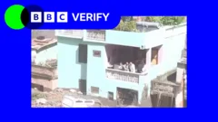 Videos show people survive floodwaters on balcony in Nepal