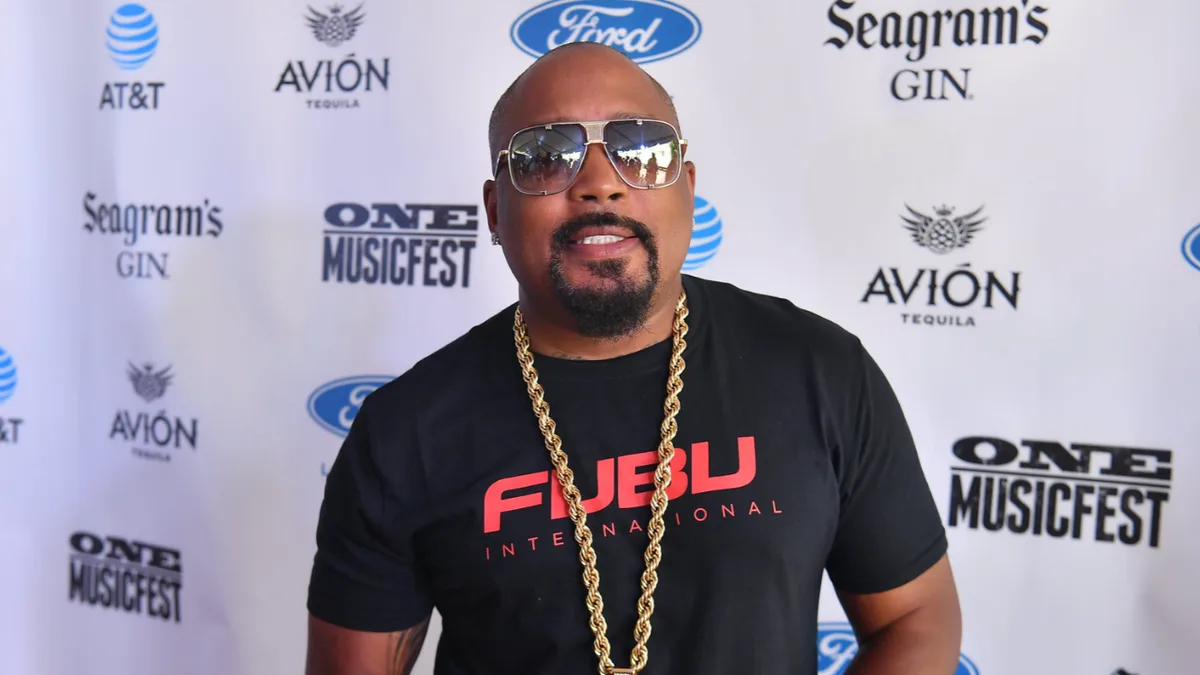 From $40 To Global Brand: Daymond John turns side hustle into FUBU empire; family and hip-hop drive rise