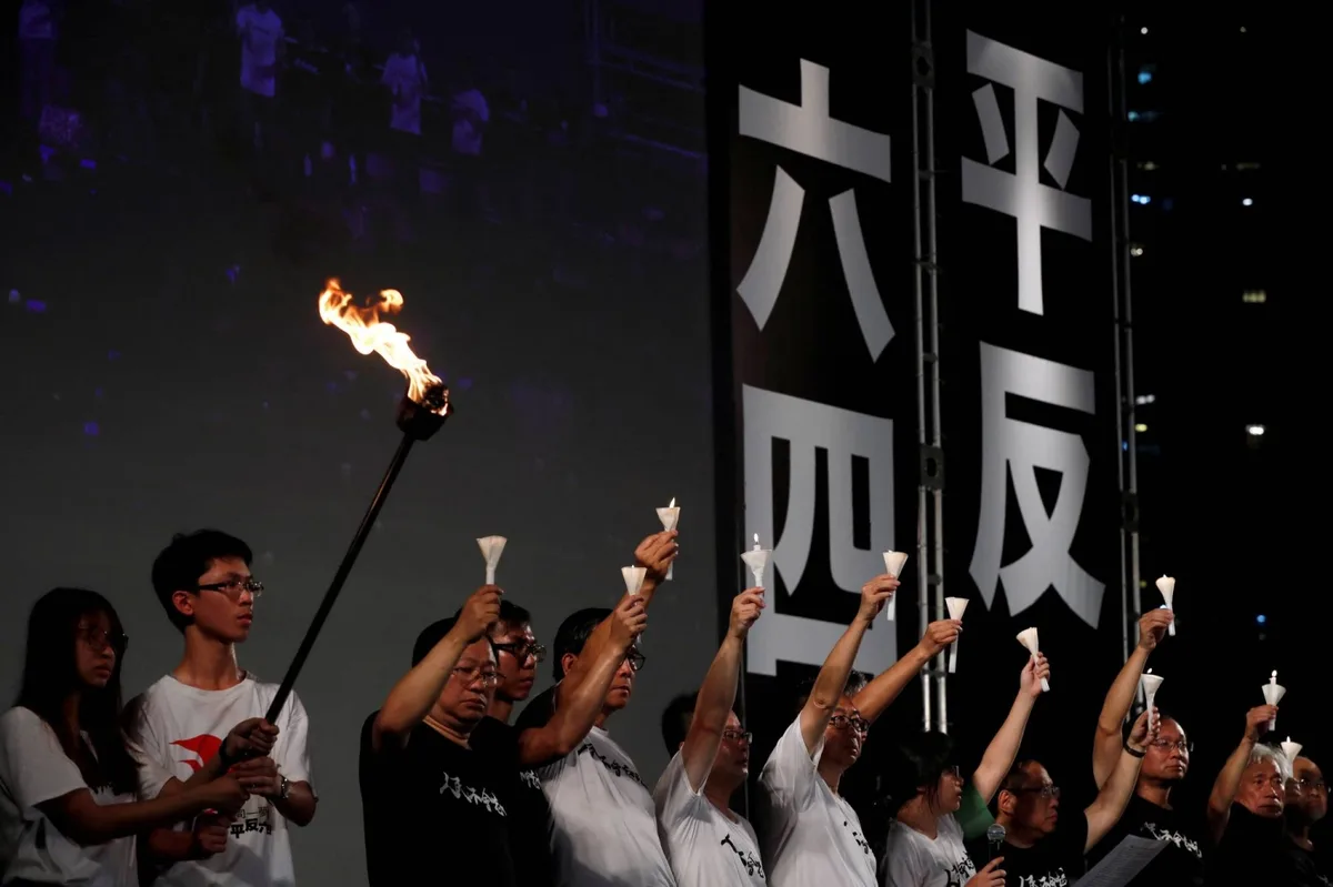 Hong Kong hits Tiananmen vigil activists with yearslong jail sentences