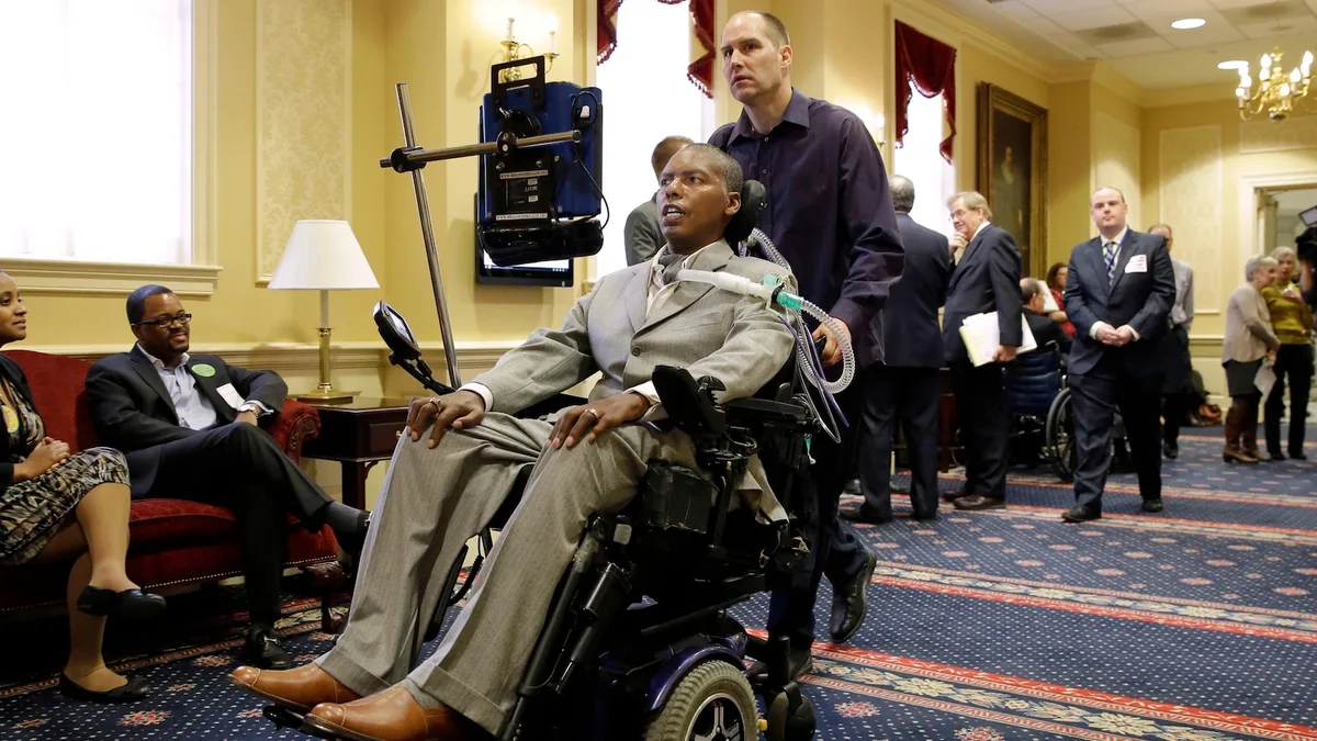 O.J. Brigance, who won a Super Bowl with the Baltimore Ravens before battling ALS, dies at age 56