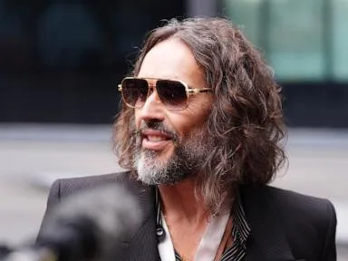 Prosecution labels Russell Brand 'ruthless sexual predator' at opening of trial
