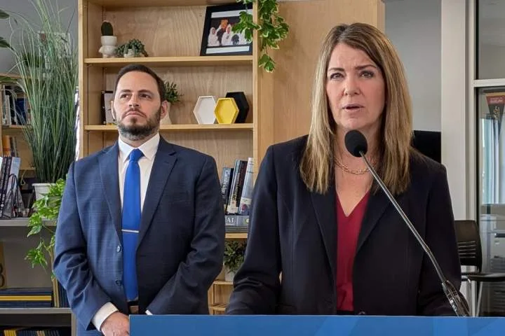 Alberta delays new restrictions on flags in schools, national anthem mandate