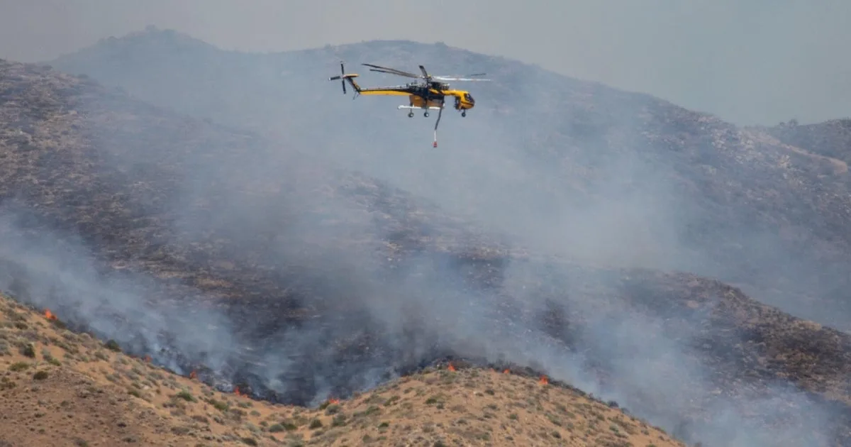 Fast-moving wildfire closes in on Reno, Nevada, forces evacuations