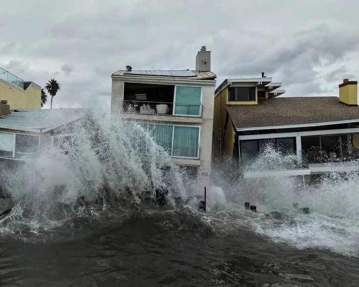 Intense waves and floods batter California waterfront homes and boardwalks