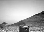 Mysterious 'flying' object in NASA Mars photo sparks theory of extraterrestrial life on the Red Planet