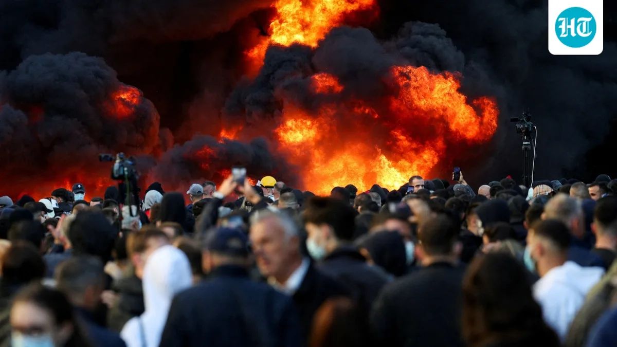 Albania protests turn violent as demonstrators demand PM's resignation; buildings torched, clashes erupt