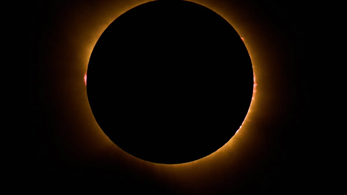 Millions crowd Spanish cities to see country's first total solar eclipse in over a century