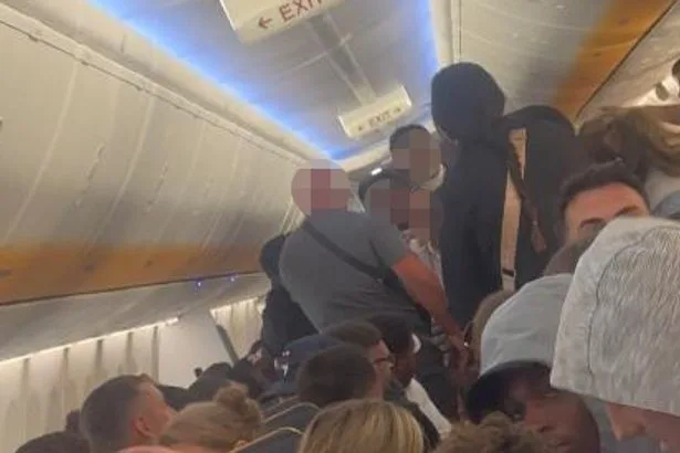 Mid-air brawl erupts on Ryanair flight to Ibiza as police race to meet plane
