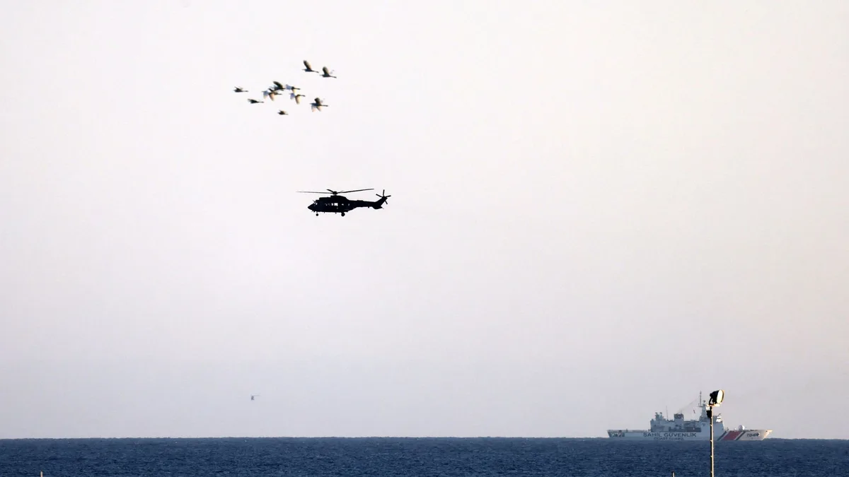 Capsized ferry disaster kills at least eight, as search for survivors continues