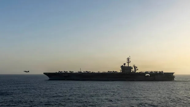 Trump dismisses reports of grim conditions on U.S. aircraft carrier