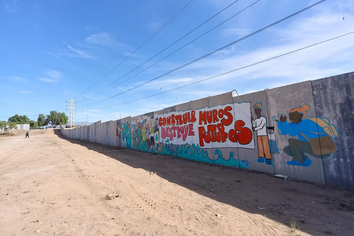 La universidad que construyó un muro junto a barrios vulnerables no lo demolerá: qué hará en su lugar
