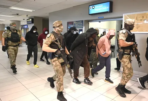 Six alleged Black Axe members extradited to US over romance-scam charges