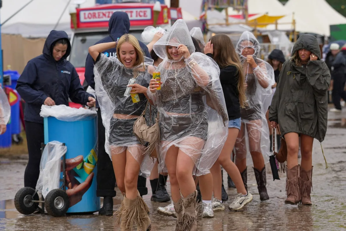 Yellow thunderstorm warning issued as festivalgoers face more wet weather