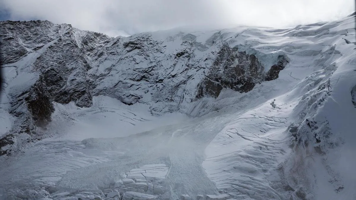 Melted Swiss glacier reveals bodies of long-lost hikers