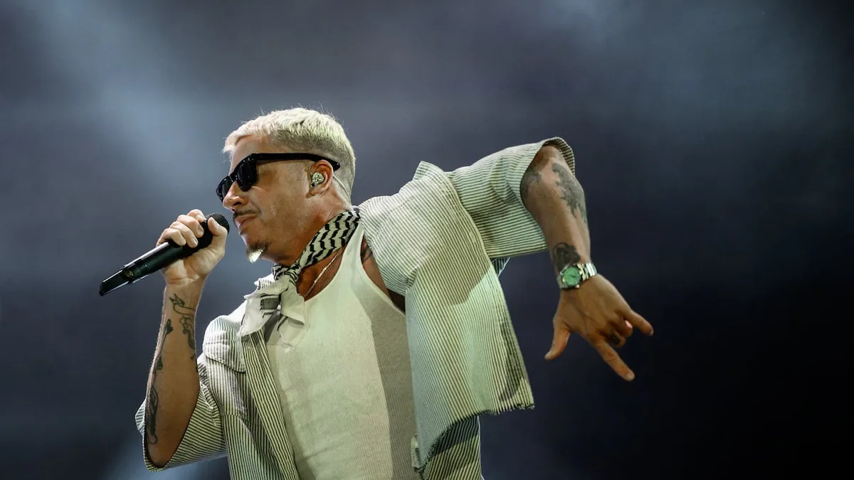 Macklemore says U.S. stadium owners pressured Ed Sheeran to drop him from tour