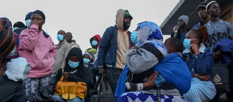 Durban refugees face uncertain future amid move from pavement to park, Lindela