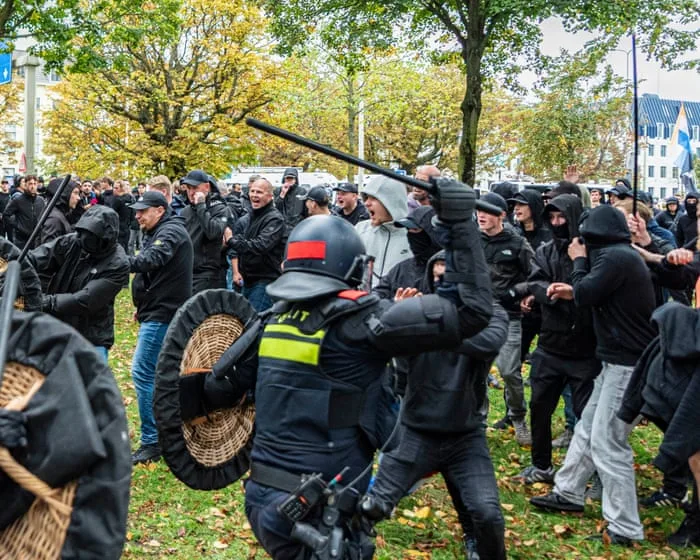 Dutch riot police break up far-right protest in The Hague after violence erupts
