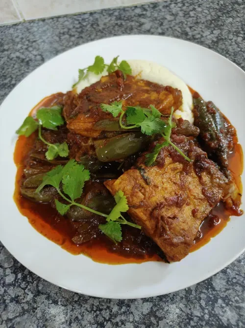 WATCH: How to make fish curry with brinjal and sangati