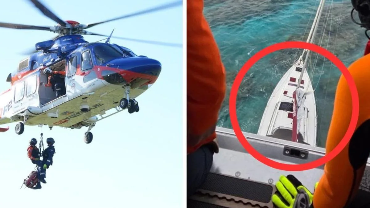 Family rescued by helicopter crew after yacht crashes on reef near Whitsundays
