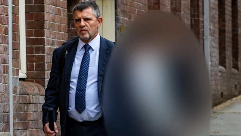 Flanked by parents and lawyers, Scots College boys in court charged with rape