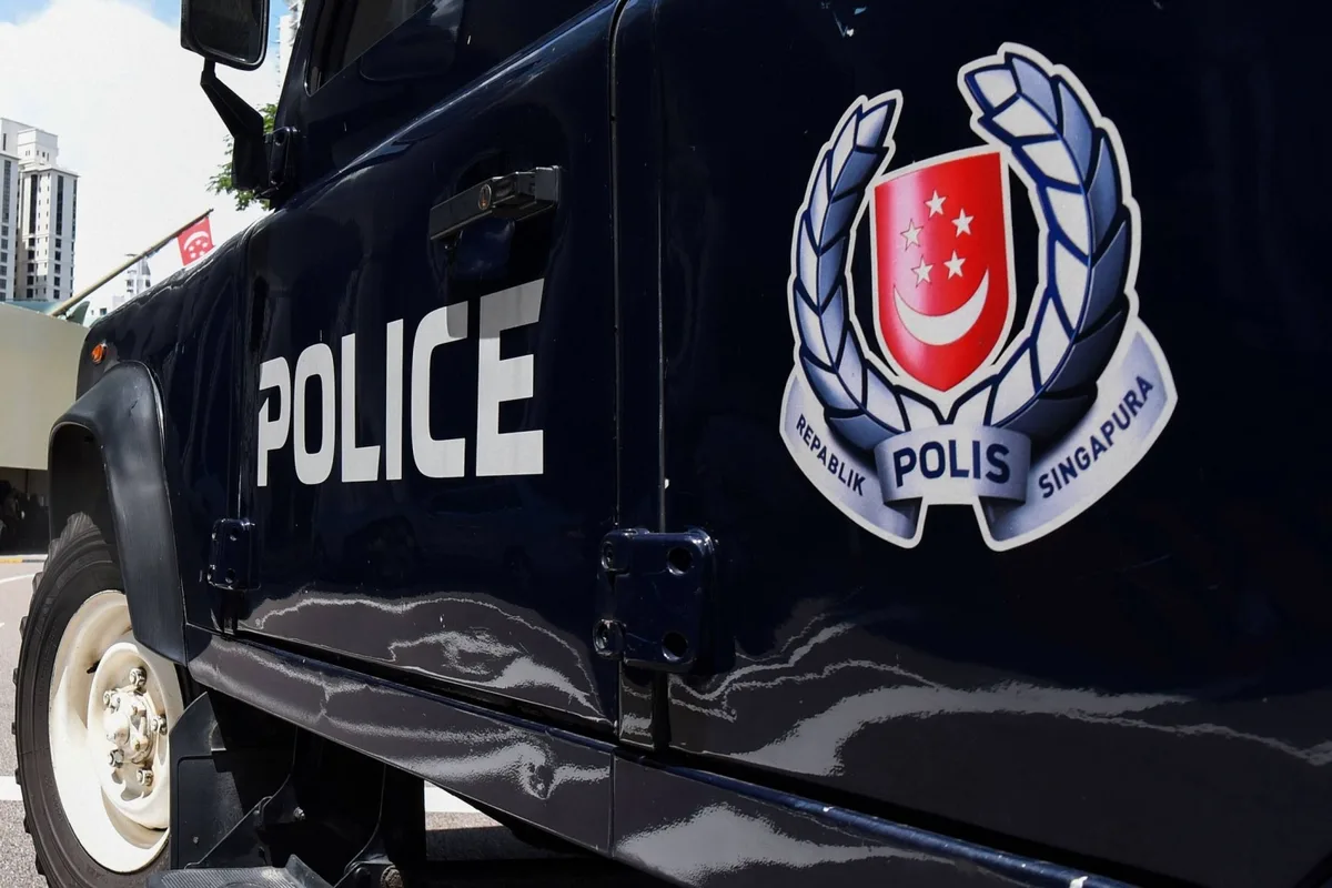 Singapore police raid Radiant World office as probe widens