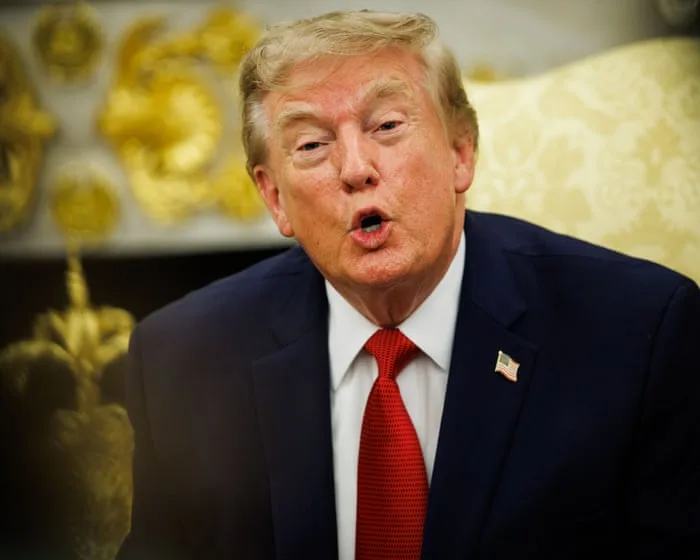 Trump tells CNN reporter to 'be quiet' during Oval Office clash – video