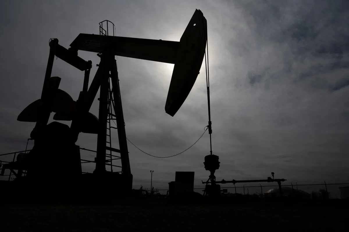 Oil slips on weaker demand outlook and higher U.S. stocks amid supply disruptions