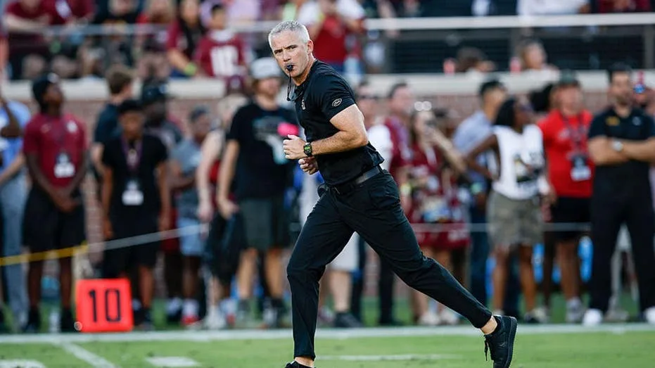 Fans falsely claim to have spotted moving trucks outside FSU head coach Mike Norvell's house