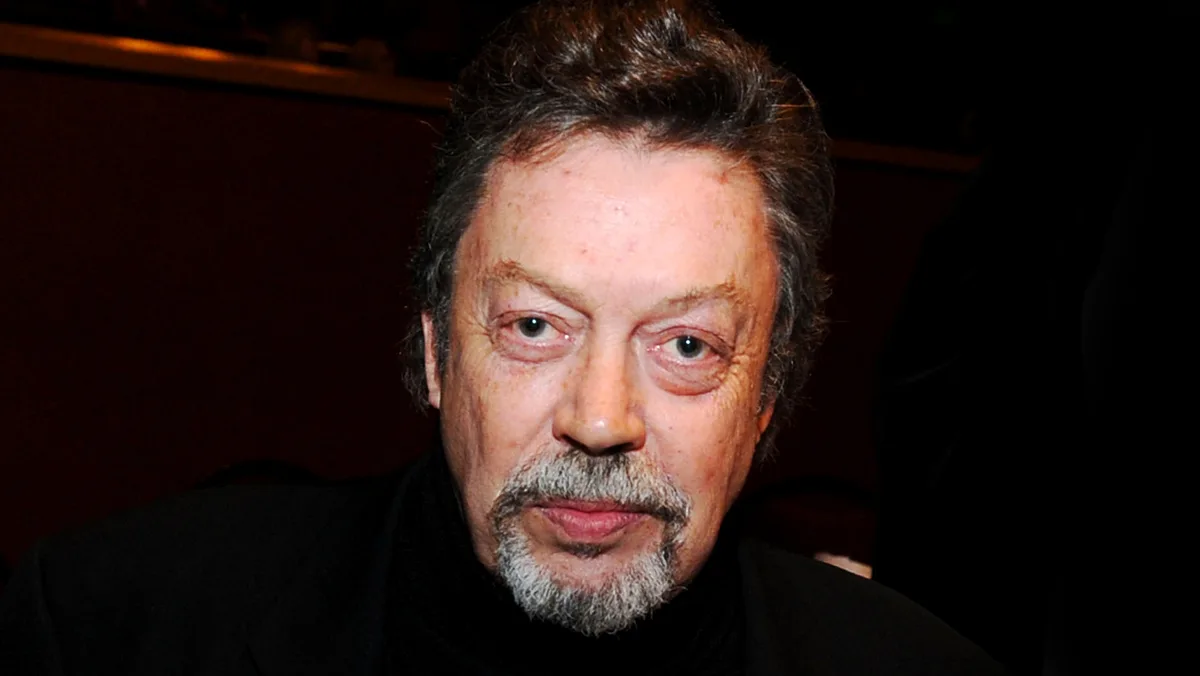 Luke Evans, ‘Clue’ Stars, Josh Gad & More Pay Tribute To Tim Curry