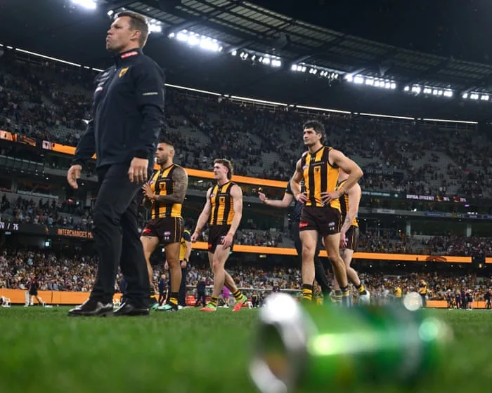 Hawks coach wanted to ‘scream with rage’ after epic AFL final, as fans criticised for throwing bottles