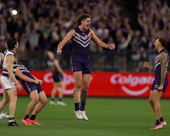 Fremantle keep AFL premiership dream alive with win against Geelong in finals classic