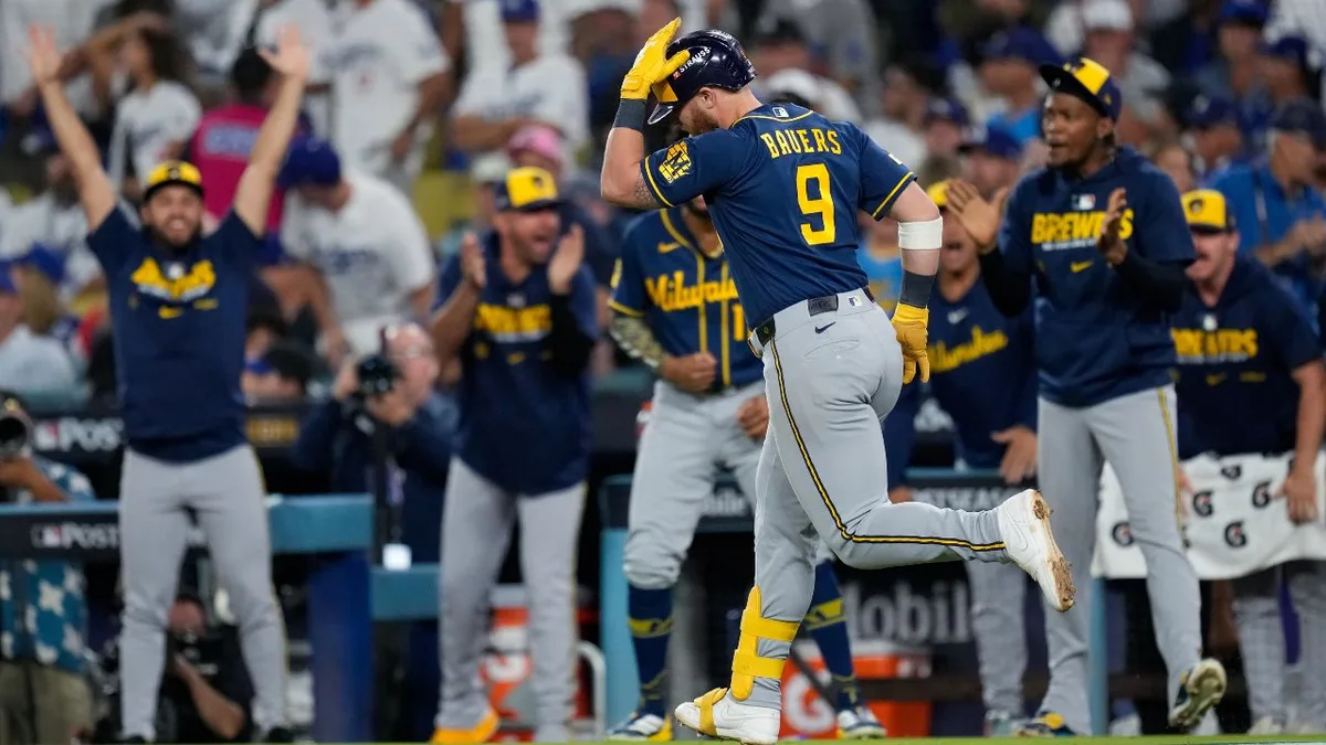 Brewers’ big swings have Dodgers on the brink in NLCS