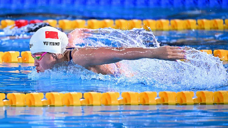Yu dominates in Astana, claims gold to complete swimming hat-trick