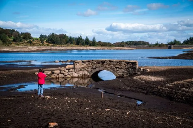 Prehistoric village unearthed at Devon reservoir after water levels drop to lowest in decades