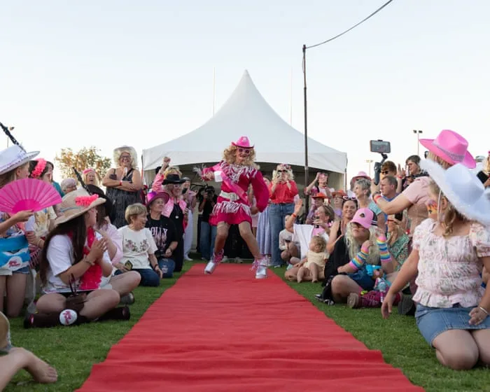 Dollywood down under: Dolly Parton super fans and drag queens turn a tiny Australian town pink