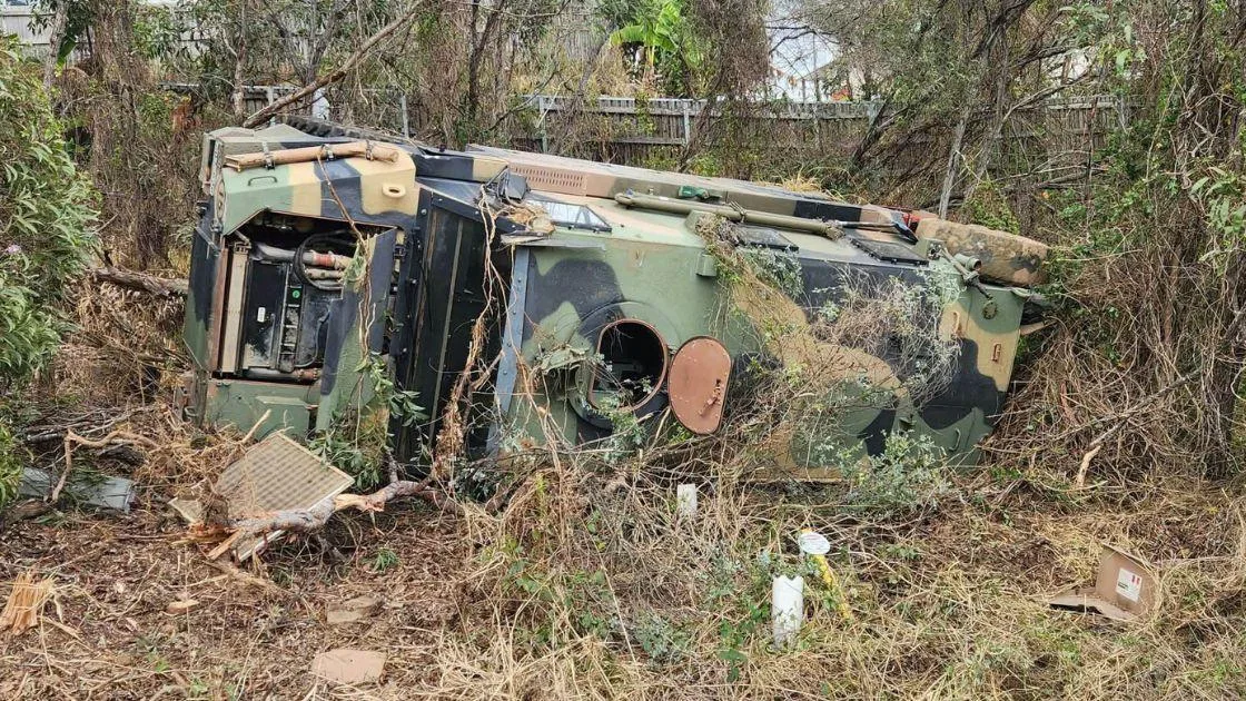 Two men hospitalised as army truck rolls on Queensland highway at Springfield