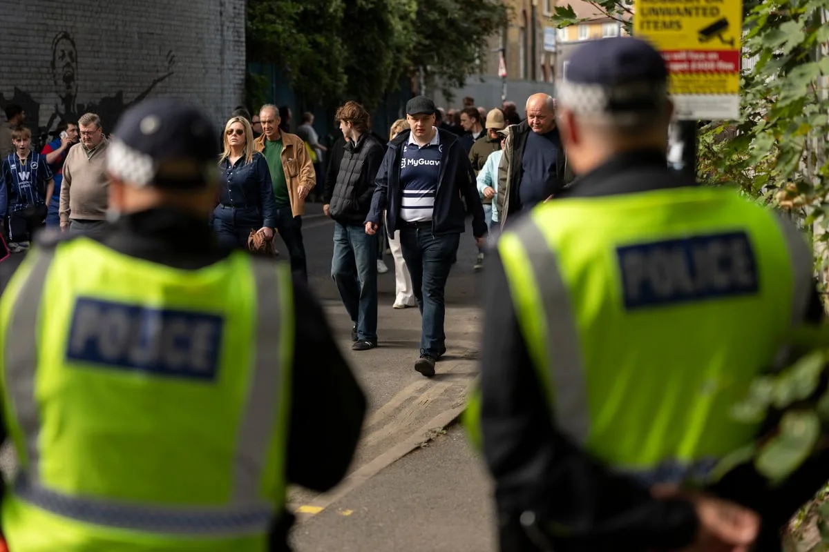 In pictures: Millwall and West Ham fans face police amid six arrests