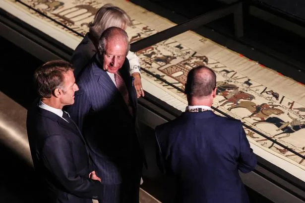 King Charles and Emmanuel Macron share lighthearted moment viewing Bayeux Tapestry