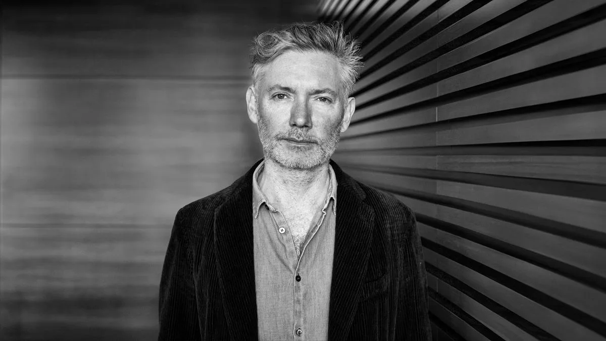 Interview | Director Kevin Macdonald on bringing his documentary instincts to ‘The Runner’ and capturing modern paranoias