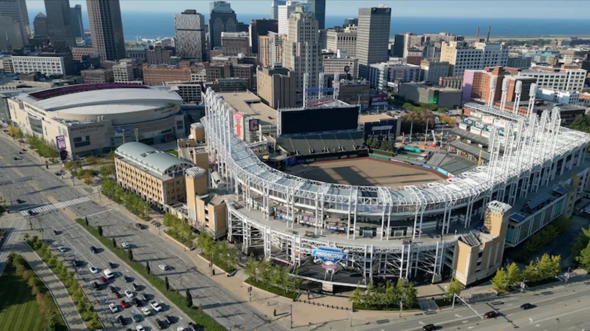 Cleveland must consider compensation after rezoning a $52,100 used-car lot investment for housing