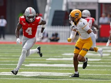 Smith sets Ohio State career receiving mark as 6th-ranked Buckeyes roll past Kent State 59-3
