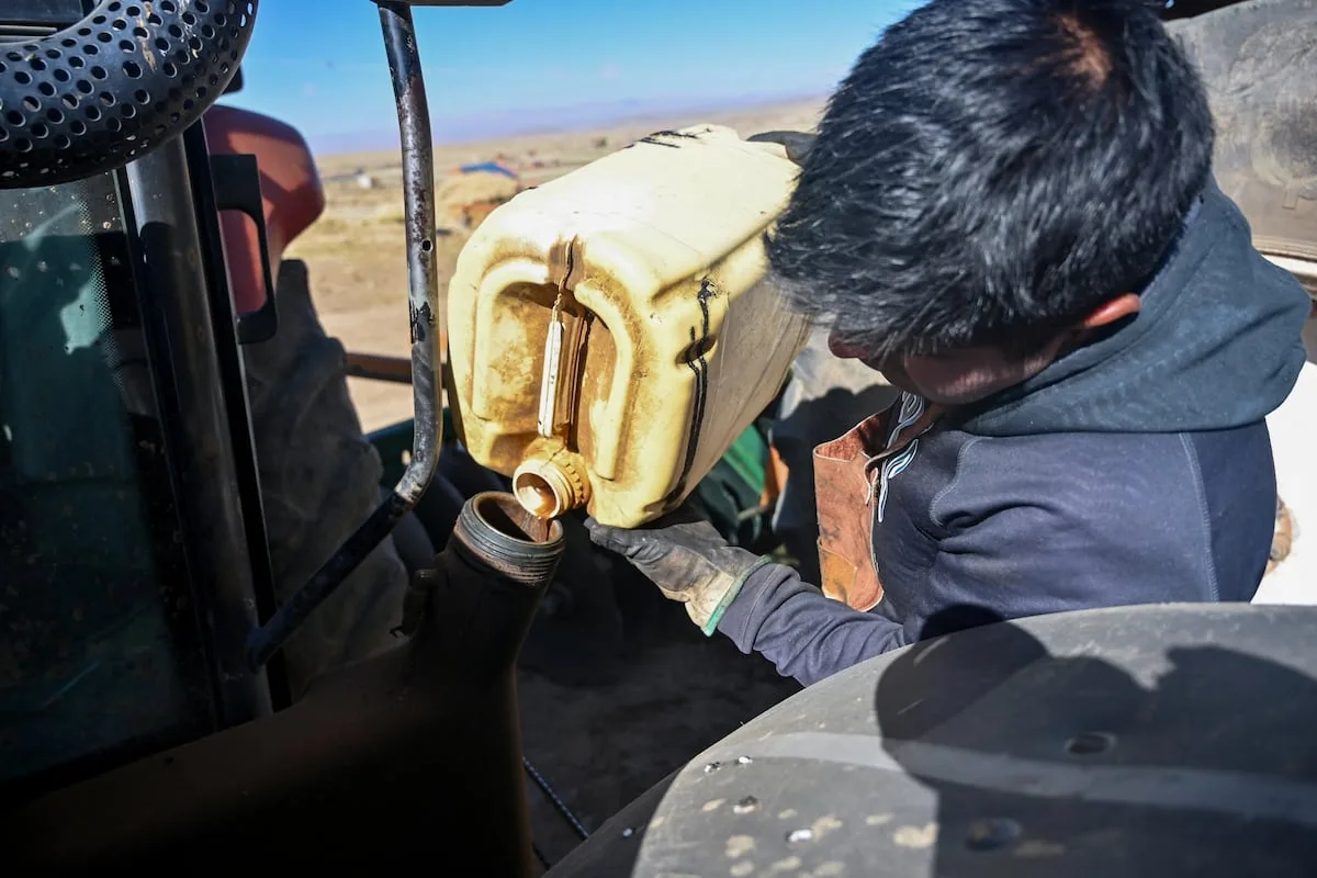 As diesel prices soar, Bolivian farmer turns trash into tractor fuel