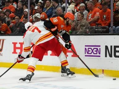Pospisil's tiebreaking third-period goal pushes Flames to first win of the season, 4-2 over Ducks