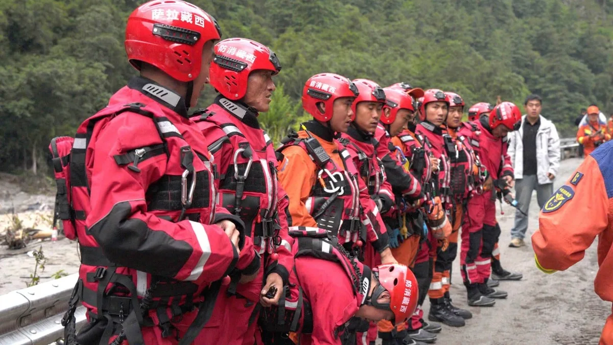 Chinese rescuers reach checkpoint destroyed by deadly flash floods along Nepal border
