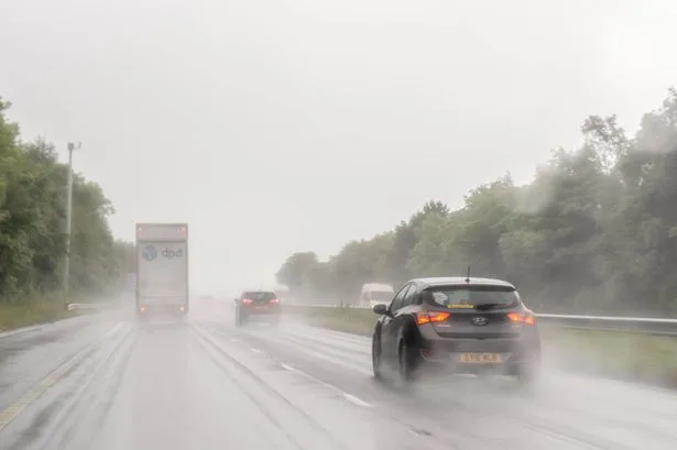 Drivers given £5k fine alert as heavy rain and thundery showers batter the UK