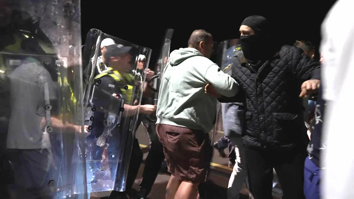 'Thuggish' behaviour at anti-migrant protest condemned - as hundreds of demonstrators gather after small boat arrival